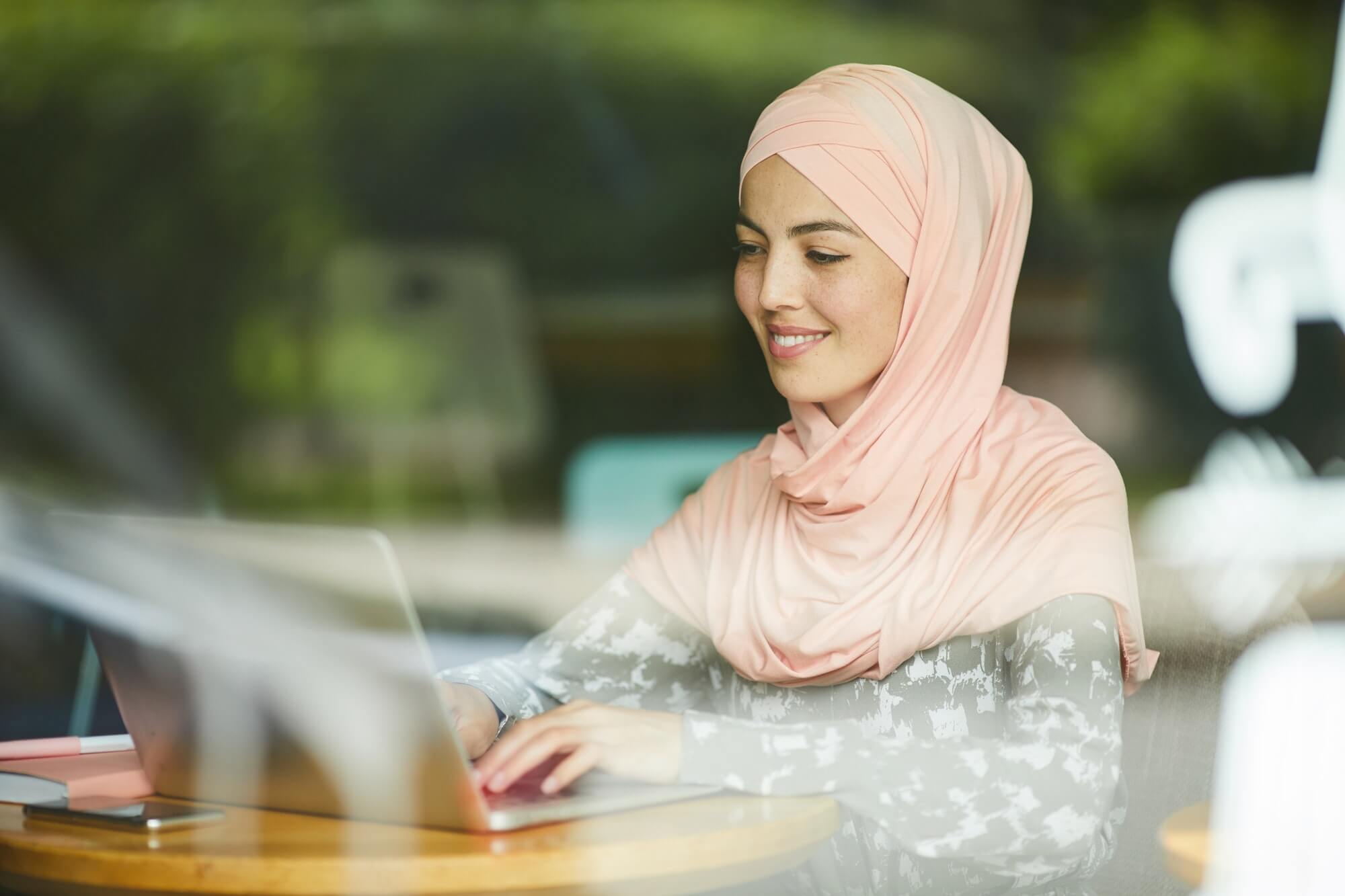 Muslim Woman Answering E Mails