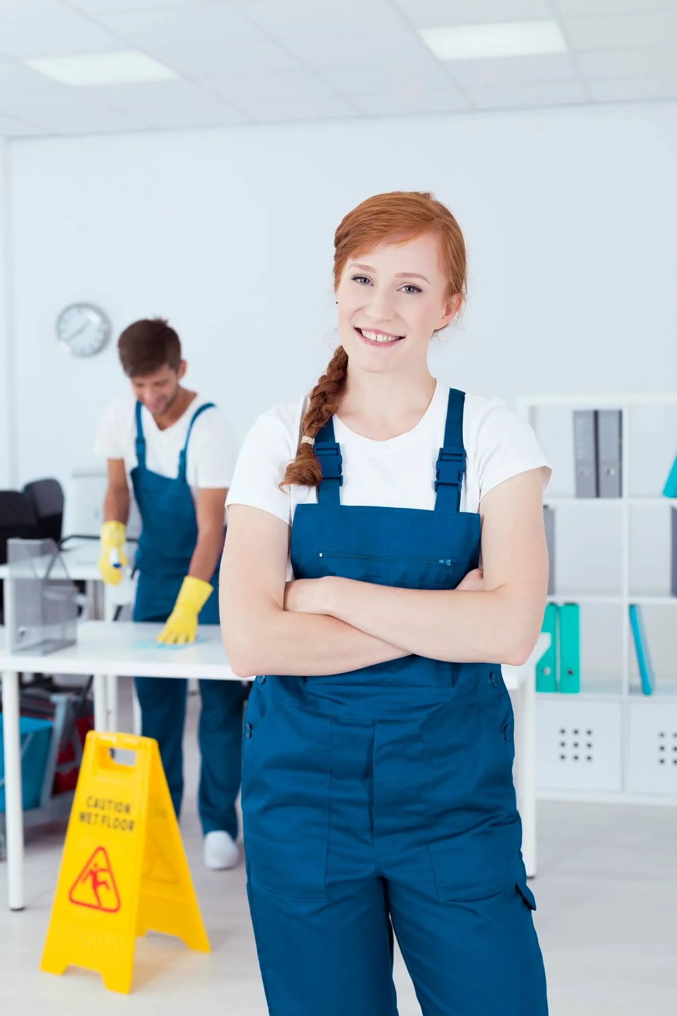Smiling cleaner in office in Horsham