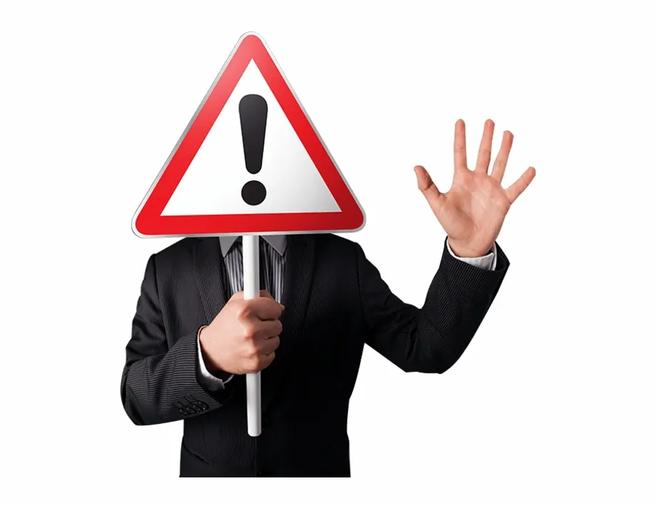 Man holding caution sign